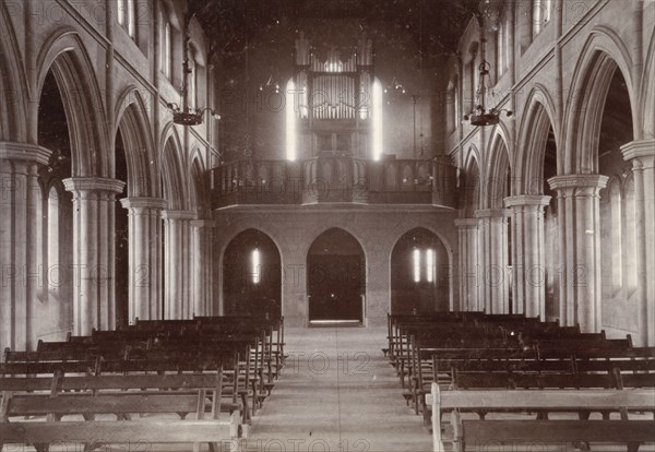 Inside St Mary's RC Cathedral, Bulawayo. Symmetrical view of the interior of St Mary's Roman Catholic Cathedral, looking down the nave to the organ at the west end. Bulawayo, Rhodesia (Zimbabwe), circa 1904. Bulawayo, Zimbabwe, Southern Africa, Africa.