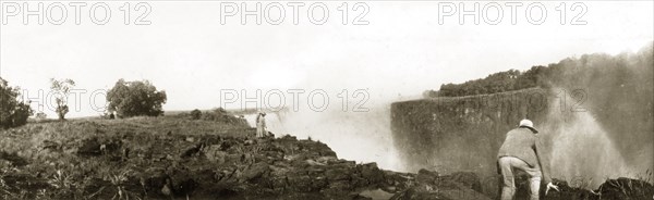 British dignitaries visit Livingstone Island. A party of British dignitaries visit Livingstone Island during a trip to Victoria Falls. Matabeleland, Rhodesia (Matabeleland North, Zimbabwe), circa 1904., Matabeleland North, Zimbabwe, Southern Africa, Africa.