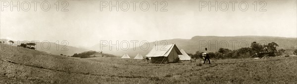 Camp site near Hay's store. A camp site nestles in a mountain valley in the vicinity of Hay's store, located about 29 kilometres (18 miles) from Fort Edward. Mr. Hay's was a British trader, renowned for his hospitality to British troops, who had set up a store with his family in the wildnerness of the Spelonken. Spelonken, Northern Transvaal (Limpopo), South Africa, 22 October 1905. Spelonken, Limpopo, South Africa, Southern Africa, Africa.