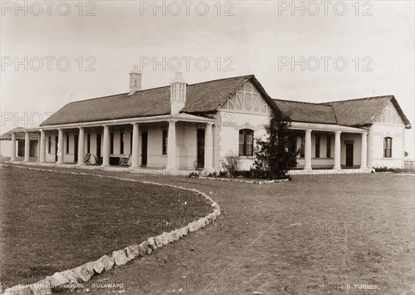 Government House in Bulawayo. View of Government House in Bulawayo, a single-storey stone building with a colonaded veranda. Bulawayo, Rhodesia (Zimbabwe), 1897. Bulawayo, Matabeleland North, Zimbabwe, Southern Africa, Africa.