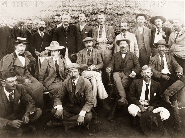 Cecil Rhodes, Arthur Lawley and Native Commissioners. Informal group portrait of Captain Arthur Lawley (1860-1932), Administrator of Matabeleland, and Cecil Rhodes (1853-1902), with Native Commissioners and other Bulawayo personalities. Bulawayo, Rhodesia (Zimbabwe), circa 1898. Bulawayo, Matabeleland North, Zimbabwe, Southern Africa, Africa.
