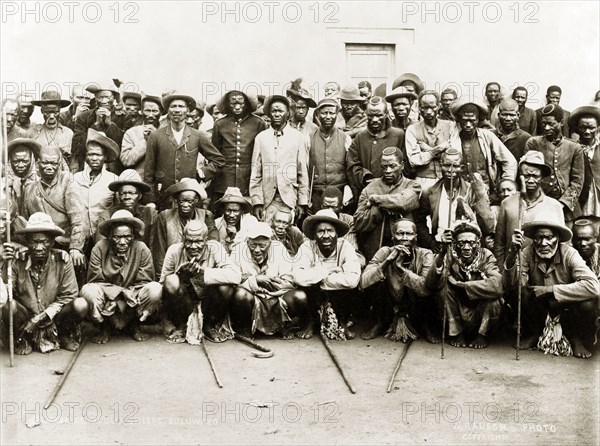 Matabele indunas. A number of Matabele (Ndebele) indunas (chiefs) pose for a group portrait outdoors after an indaba (council) with British officials following the Matabele rebellion of 1896. Bulawayo, Rhodesia (Zimbabwe), 1897. Bulawayo, Matabeleland North, Zimbabwe, Southern Africa, Africa.