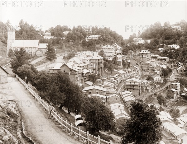 View over Murree. View over the town of Murree, a hillstation founded by the British in the Himalayan foothills in 1851. The town is dominated by colonial architecture, including a Western-style church that sits on a hill overlooking the town. Murree, Punjab, India (Pakistan), circa 1927. Murree, Punjab, Pakistan, Southern Asia, Asia.