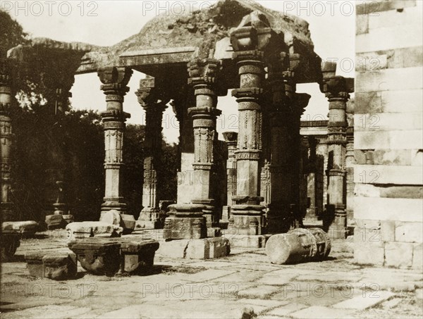 Hindu temple at the Qutb Minar complex. The remnants of a ruined Hindu temple, part of the Qutb Minar complex in Delhi, which was built during the Slave Dynasty (1206-90) to celebrate the onset of Islamic rule in India in 1192. Delhi, India, circa 1928. Delhi, Delhi, India, Southern Asia, Asia.