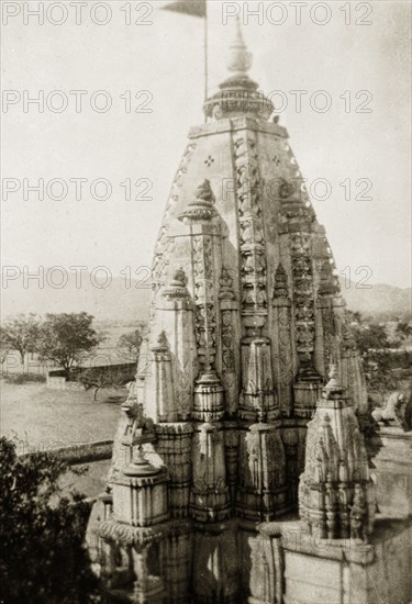 Brahma Temple in Pushkar, India. View of the ornately carved 'sikhara' (tower) of the Brahma Temple, a 14th century structure built in dedication to the Hindu deity Lord Brahma, who is worshipped as Creator of the World. Pushkar, Ajmer-Merwara (Rajasthan), India, circa 1928. Pushkar, Rajasthan, India, Southern Asia, Asia.