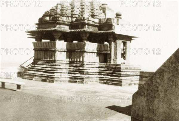 Sas-bahu Temple at Gwalior. View of the smaller Sas-bahu Temple, located within the Gwalior Fort complex. Built in the ninth century, the temple is intricately decorated with sculptures and carvings dedicated to the Hindu deity Vishnu. Gwalior, Central Provinces and Berar (Madhya Pradesh), India, circa 1927. Gwalior, Madhya Pradesh, India, Southern Asia, Asia.