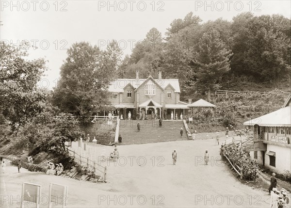 The Post Office building in Muree. View of the colonial-style Post Office building in Murree, set back from the main road at the top of a wide flight of steps. Murree, Punjab, India (Pakistan), circa 1927. Murree, Punjab, Pakistan, Southern Asia, Asia.