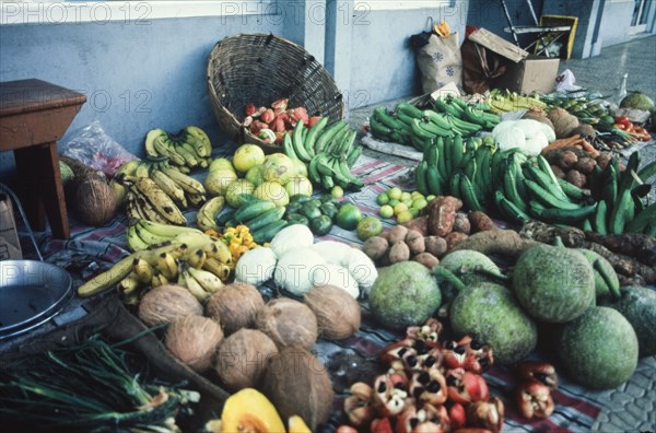 A Jamaican fruit market. An official Jamaican Tourist Board photograph features a colourful display of fruit at an outdoor market in Kingston. Kingston, Jamaica. Kingston, Kingston, Jamaica, Caribbean, North America .