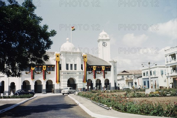 Third anniversary of Ghanaian independence. The General Post Office in Accra, decorated with banners to commemorate the third anniversary of Ghanaian independence. Accra, Ghana, circa March 1960. Accra, East (Ghana), Ghana, Western Africa, Africa.