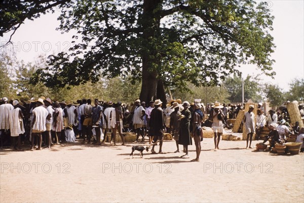 Bolgatanga market, Ghana. A bustling outdoor market in Bolgatanga. Bolgatanga, Ghana, circa 1961. Bolgatanga, Upper East, Ghana, Western Africa, Africa.