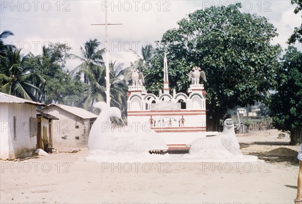 Shrine of Asafo Number Two Company. The 'posuban' (military shrine) of Asafo Number Two Company at Lowtown. This shrine was built in 1921, and the sculpture added by Kwamina Amoako in the 1950s. Saltpond, Ghana, April 1960. Saltpond, West (Ghana), Ghana, Western Africa, Africa.