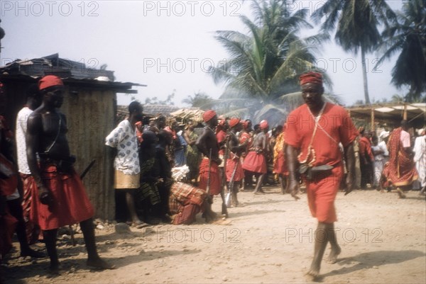 Asafo Number Two Company. Members of Asafo Number Two Company attend a ceremony in Lowtown. Saltpond, Ghana, April 1960. Saltpond, West (Ghana), Ghana, Western Africa, Africa.