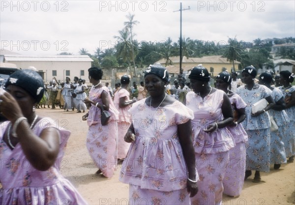 Women dancing in Easter parade. Ghanaian women dance in procession during an Easter parade. Saltpond, Ghana, circa 1960. Saltpond, West (Ghana), Ghana, Western Africa, Africa.