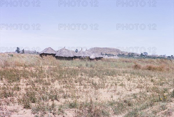 A Hausa village on the Nigerian plains. The thatched roofs of a Hausa settlement located on the Nigerian plains. Nigeria, October 1963. Nigeria, Western Africa, Africa.