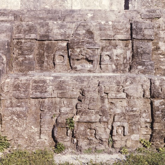 Ancient stone carving at Altun Ha. An ancient stone carving, inscribed into the walls of a temple at the ruined Mayan city of Altun Ha. Belize District, Belize, circa 1975., Belize, Belize, Central America, North America .