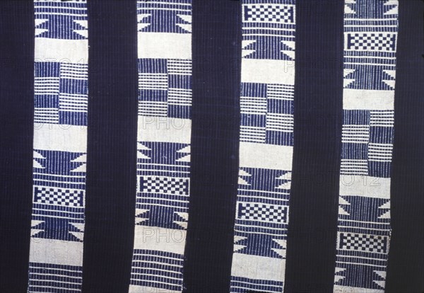 Nigerian woven textile. Close-up of a Nigerian textile, woven in a pattern with blue and white thread. Nigeria, circa 1975. Nigeria, Western Africa, Africa.