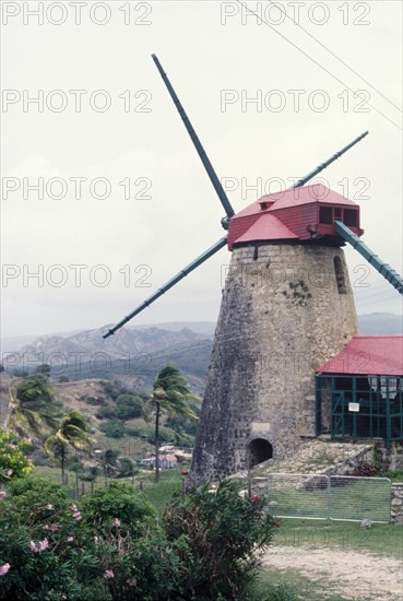 The Morgan Lewis Sugar Mill. View of the Morgan Lewis Sugar Mill, located on a sugar plantation in Barbados. Originally built in 1727, it was restored in 1974 and again in 1996, by the Barbados National Trust who restored it to become one of the only working windmills in the Caribbean. St Andrew, Barbados, circa 1975., St Andrew (Barbados), Barbados, Caribbean, North America .