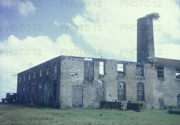 Abandoned sugar factory, Barbados. The ruins of an abandoned sugar factory on a plantation in Barbados. St Andrew, Barbados, circa 1975., St Andrew (Barbados), Barbados, Caribbean, North America .