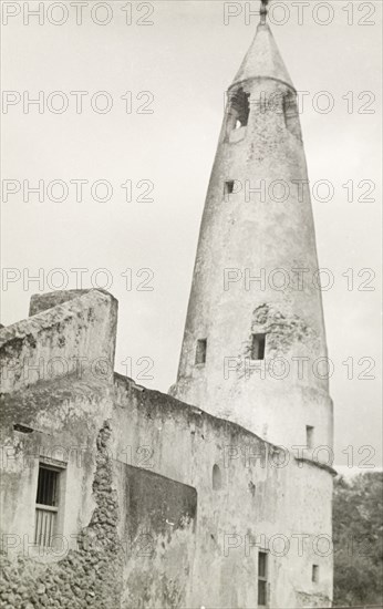 Friday Mosque at Shela. The Friday Mosque at Shela, built in 1829 and recognisable by its distinctive conical minaret. Lamu, Kenya, circa 1947. Lamu, Coast, Kenya, Eastern Africa, Africa.