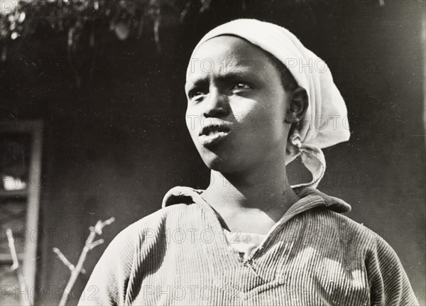 Kikuyu woman educated by Scottish missionaries. Portrait of a young Kikuyu woman, educated by Church of Scotland missionnaries in Tumutumu. South Nyeri, Kenya, 1936. Nyeri, Central (Kenya), Kenya, Eastern Africa, Africa.