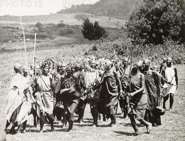 Kikuyu ritual circumcision dance. Kikuyu women perform a ceremonial dance during an annual circumcision ritual, marking the initiation of adolescent girls into adulthood. South Nyeri, Kenya, 1936. Nyeri, Central (Kenya), Kenya, Eastern Africa, Africa.