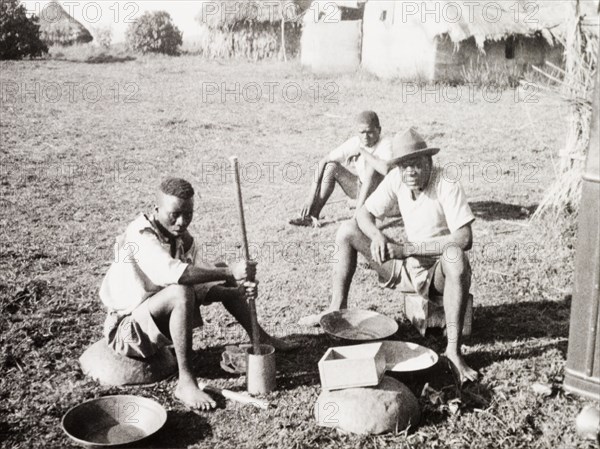 Kakamega goldfield labourers. Labourers at Kakamega goldfields take a rest from panning for gold. Kakamega, Kenya, 1933. Kakamega, West (Kenya), Kenya, Eastern Africa, Africa.