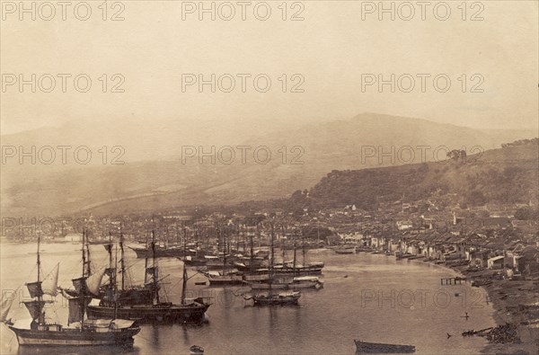 St. Pierre before the Mount Pelee eruption. View of sailing ships in St. Pierre harbour, taken shortly before the eruption of Mount Pelee on 8 May 1902, which destroyed the city and killed around 29,000 people. Martinique, circa 1902. Martinique (France), Caribbean, North America .