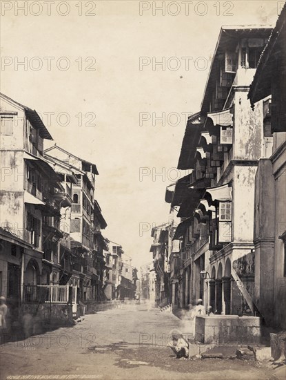 A street in Fort, Bombay. Multi-storeyed, balconied buildings flank a street in the downtown district of Fort. Bombay (Mumbai), India, circa 1883. Mumbai, Maharashtra, India, Southern Asia, Asia.