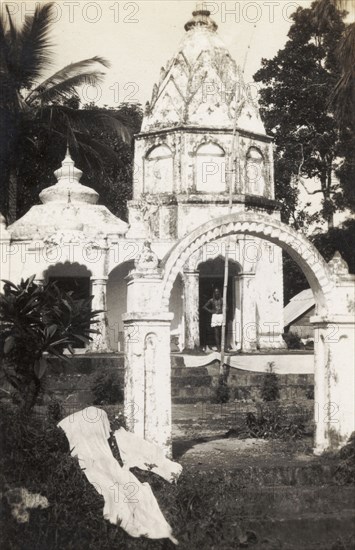 A Hindu temple in Trinidad. A Hindu temple in Trinidad, one of many established by Indian indentured workers who emigrated to the Caribbean during the mid 19th century. Probably Trinidad, circa 1931. Trinidad and Tobago, Caribbean, North America .