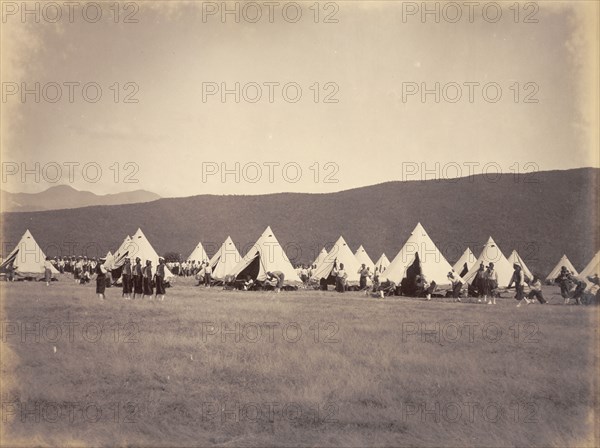 Second West India Regiment under canvas. Bell tents belonging to the Second West India Regiment are pitched at a military camp in a mountain valley. Formed by the British as a colonial infantry regiment, the troops comprised freed slaves from North America and purchased slaves from the West Indies. Jamaica, circa 1891. Jamaica, Caribbean, North America .