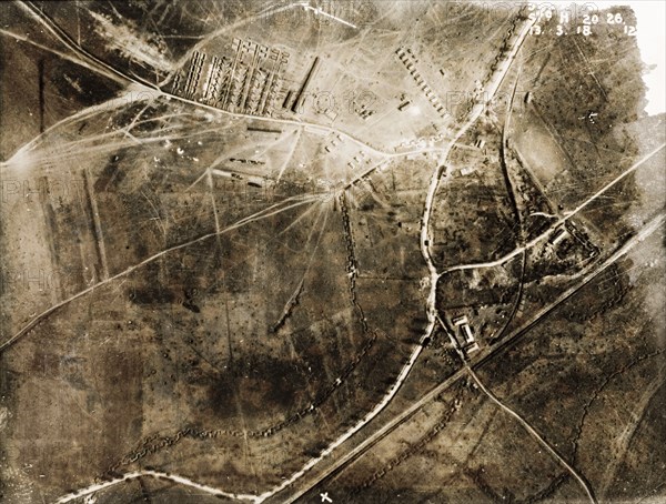 Aerial view of a military camp and trenches. One of a series of British aerial reconnaissance photographs recording the positions of trenches on the Western Front during the First World War. A military camp is surrounded by a heavily fortified system of square-toothed trenches. Nord-Pas de Calais or Picardie, France, 13 March 1918., Nord-Pas de Calais, France, Western Europe, Europe .