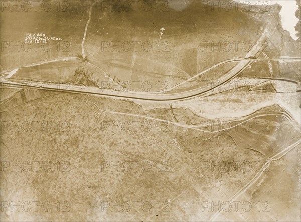 A railway track on the Western Front. One of a series of British aerial reconnaissance photographs recording the positions of trenches on the Western Front during the First World War. Trenches zig-zag their way across fields, intersected by a prominent line, probably a railway track, which runs from west to north. Nord-Pas de Calais or Picardie, France, 8 March 1918., Nord-Pas de Calais, France, Western Europe, Europe .