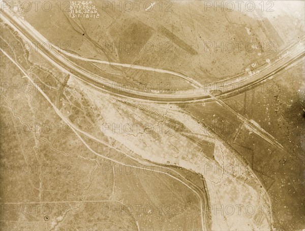 A railway track on the Western Front. One of a series of British aerial reconnaissance photographs recording the positions of trenches on the Western Front during the First World War. Trenches zig-zag their way across fields, intersected by a prominent line, probably a railway track, which runs from west to north. Nord-Pas de Calais or Picardie, France, 15 March 1918., Nord-Pas de Calais, France, Western Europe, Europe .