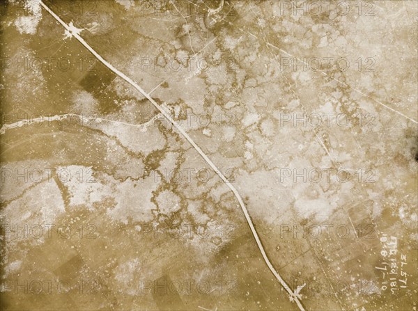 A mined road on the Western Front. One of a series of British aerial reconnaissance photographs recording the positions of trenches on the Western Front during the First World War. Two white circles on the main road indicate the explosion points of mines. Nord-Pas de Calais or Picardie, France, 18 August 1917., Nord-Pas de Calais, France, Western Europe, Europe .