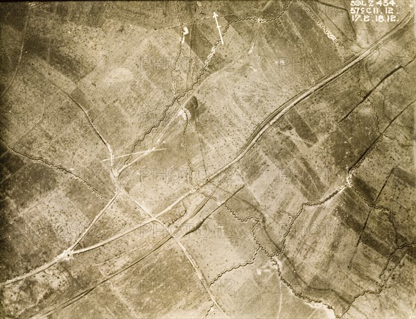 A trench system on the Western Front. One of a series of British aerial reconnaissance photographs recording the positions of trenches on the Western Front during the First World War. An intricate trench system zig-zags its way across a patchwork of fields pockmarked with bomb craters. Nord-Pas de Calais or Picardie, France, 17 February 1918., Nord-Pas de Calais, France, Western Europe, Europe .