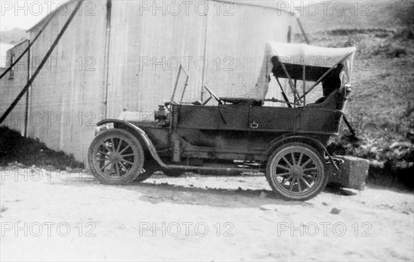 The Lawrence family's touring car. A Ford Model T touring car belonging to the Lawrence family is pictured on a seaside road during a family holiday to Jersey. Sir Henry Staveley Lawrence was a British civil servant in India and was serving as Acting Governor of Bombay at the time of this photograph. St Ouen's Bay, Jersey, January 1926. St Ouen's Bay, Jersey, Channel Islands, Western Europe, Europe .