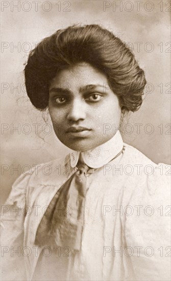 Portrait of Emily Good. Studio portrait of Emily Good, an Indian ayah (nursemaid) working for a British family in the Indian Civil Service. India, circa 1910. India, Southern Asia, Asia.