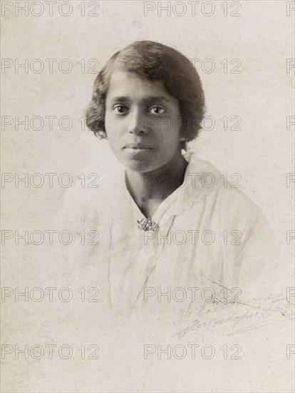 Portrait of Nannie. Portrait of an Indian ayah (nursemaid) called Nannie, aged around 20 years. Nannie worked for a British family (the Lawrences) in India, later moving with them to England where she lived for the rest of her life. Location unknown, circa 1910.
