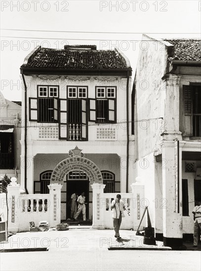 Singapore Factory and Shop Worker's Union . The decorative facade of the branch office of the Singapore Factory and Shop Worker's Union. Singapore, circa 1956. Singapore, South East Asia, Asia.