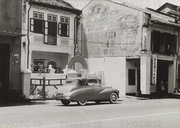 Singapore Factory and Shop Worker's Union. The branch office of the Singapore Factory and Shop Worker's Union on a commercial street in Singapore. Singapore, circa 1956. Singapore, South East Asia, Asia.