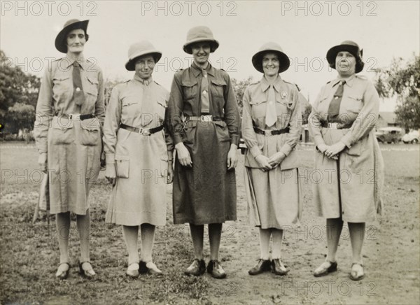 Girl Guide leaders, India. Group portrait of five Girl Guide leaders who pose for the camera dressed in full scouting uniform. India, circa 1930. India, Southern Asia, Asia.