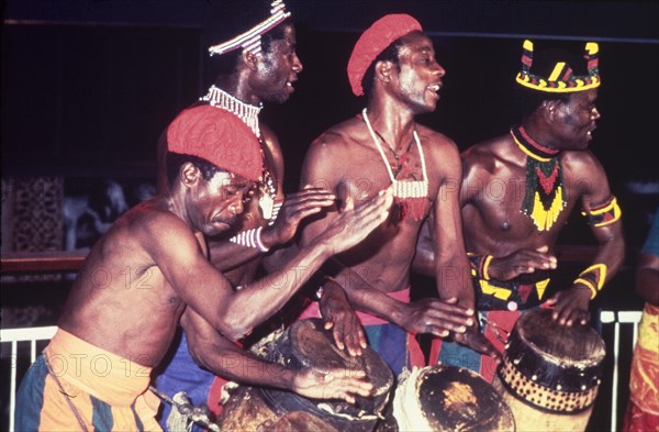 A Zambian dance group. A Zambian dance group in traditional African dress perform during a cultural festival held at the Commonwealth Institute. London, England, circa 1985. London, London, City of, England (United Kingdom), Western Europe, Europe .