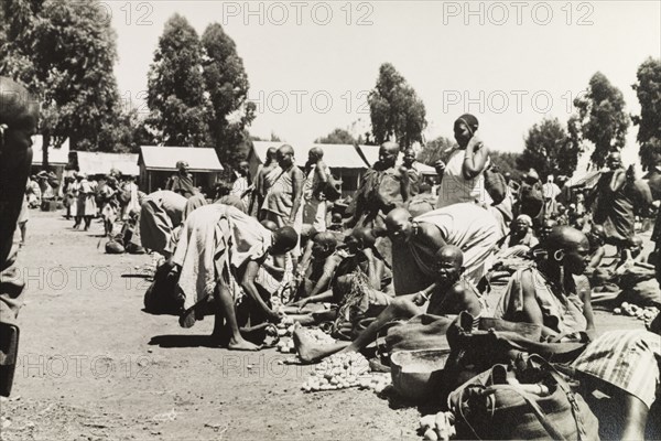 Karatina market . Kikuyu traders display their wares on the ground at Karatina market. South Nyeri, Kenya, 1936. Nyeri, Central (Kenya), Kenya, Eastern Africa, Africa.