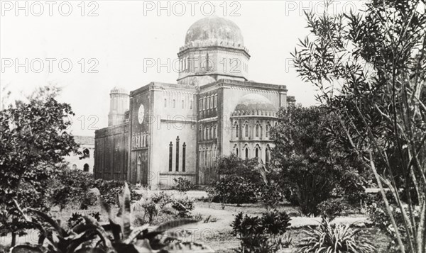 Mombasa Cathedral, circa 1910. Exterior view of Mombasa Cathedral, featuring a domed transept tower and an apse projecting from its west end. Mombasa, Kenya, circa 1910. Mombasa, Coast, Kenya, Eastern Africa, Africa.
