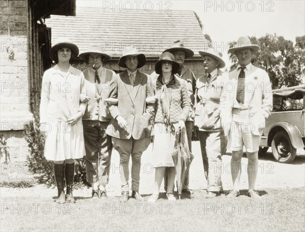 Evelyn Waugh and friends visit the Kakamega goldfields. Evelyn Waugh (1903-1966) (far right) poses for a group portrait with companions during a trip to the Kakamega gold fields. Kakamega, Kenya, circa 1930. Kakamega, West (Kenya), Kenya, Eastern Africa, Africa.