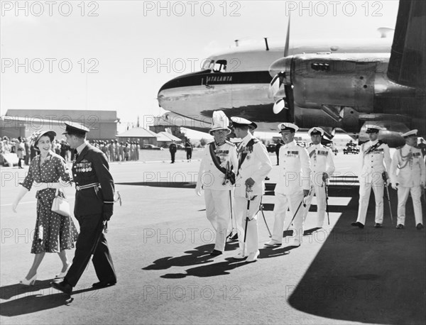 Princess Elizabeth arrives in Nairobi, 1952. Princess Elizabeth and the Duke of Edinburgh are greeted by Sir Phillip Mitchell, the Governor of Kenya, as they disembark from an aeroplane shortly after arriving at Eastleigh Airport. Nairobi, Kenya, February 1952. Nairobi, Nairobi Area, Kenya, Eastern Africa, Africa.