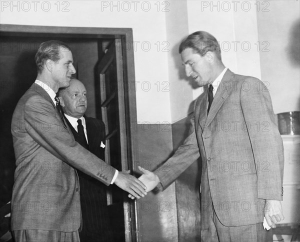 The Duke of Edinburgh meets Dr Gratton. The Duke of Edinburgh shakes hands with Dr Gratton as he is welcomed to the King George VI Hospital (now Kenyatta National Hospital), during a royal visit to Kenya. Nairobi, Kenya, February 1952. Nairobi, Nairobi Area, Kenya, Eastern Africa, Africa.