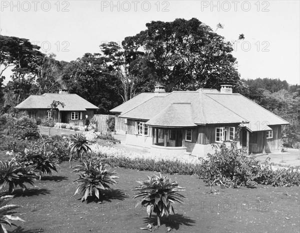 The Royal Lodge in Nyeri. Rear view of the Royal Lodge in Nyeri, presented to Princess Elizabeth and the Duke of Edinburgh by the people of Kenya in 1952. The royal couple's official tour of Kenya was cut unexpectedly short by the death of King George VI on 6 February, and they left the country before visiting the lodge. Nyeri, Kenya, February 1952. Nyeri, Central (Kenya), Kenya, Eastern Africa, Africa.