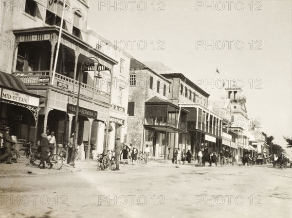 Front Street, Bermuda. View of the Bank of Bermuda Ltd. building on a row of shops on Front Street, a commercial road at Hamilton's waterfront. Hamilton, Bermuda, circa 1931. Hamilton, Bermuda, Bermuda, Atlantic Ocean, Africa.