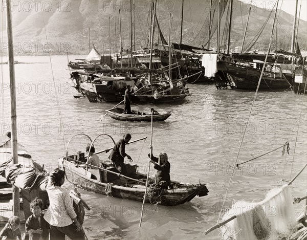 Sampans and junks in Aberdeen Harbour. Sampans and junks moored in Aberdeen Harbour. Aberdeen, Hong Kong, China, 1963. Aberdeen, Hong Kong, China, People's Republic of, Eastern Asia, Asia.
